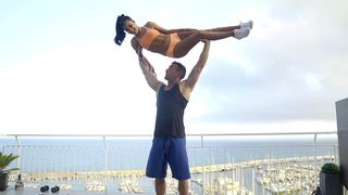 Spinner teases athletic guy with her XXX assets during workout on roof